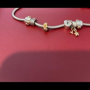 Pandora 14k yellow gold rose spacer.